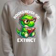 Books Never Go Extinct Reading Dinosaur Bookish Nerdy Raglan Sleeve Sweatshirt Heather Forest