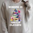 Books Reading Is Fun Turtely Awesome Sea Turtle Reading Book Raglan Sleeve Sweatshirt Heather Forest