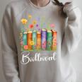 Booktrovert Book Reader Book Nerd Book Reading Lover Premium Tri-Blend Raglan Sleeve Sweatshirt Heather Forest