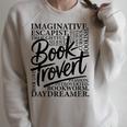 Booktrovert Reader Introvert Book Lover Premium Tri-Blend Raglan Sleeve Sweatshirt Heather Forest
