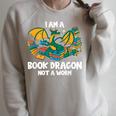 Bookworm Books Reading I Am A Book Dragon Raglan Sleeve Sweatshirt Heather Forest