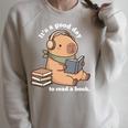 Capybara Reading a Book Cute Reading For Boys Girls Premium Tri-Blend Raglan Sleeve Sweatshirt Heather Forest