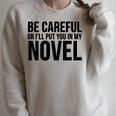 Be Careful Or I'Ll Put You In My Novel Book Author Raglan Sleeve Sweatshirt Heather Forest