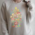 Christmas Tree Library Xmas Lights Tree Book Lover Librarian Raglan Sleeve Sweatshirt Heather Forest Christmas Tree Library Xmas Lights Tree Book Lover Librarian Raglan Sleeve Sweatshirt Heather Forest