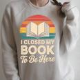 I Closed My Book To Be Here Reading Premium Tri-Blend Raglan Sleeve Sweatshirt Heather Forest I Closed My Book To Be Here Reading Premium Tri-Blend Raglan Sleeve Sweatshirt Heather Forest