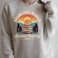Color Our World Summer Reading 2025 Cute Book Wildflowers Raglan Sleeve Sweatshirt Heather Forest Color Our World Summer Reading 2025 Cute Book Wildflowers Raglan Sleeve Sweatshirt Heather Forest