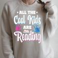 All The Cool Kids Are Reading Book Vintage Retro Sunset Raglan Sleeve Sweatshirt Heather Forest