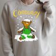Corduroy Teddy Bear In The Snow Christmas Children's Book Raglan Sleeve Sweatshirt Heather Forest Corduroy Teddy Bear In The Snow Christmas Children's Book Raglan Sleeve Sweatshirt Heather Forest