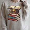 Cozy Reading Nook Between Books Book Lover Aesthetic Raglan Sleeve Sweatshirt Heather Forest