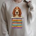 Cute Basset Hound Dog Reading On Pile Of Books Raglan Sleeve Sweatshirt Heather Forest