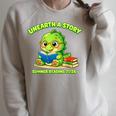 Cute Dino Book Lover Unearth A Story Summer Reading Raglan Sleeve Sweatshirt Heather Forest Cute Dino Book Lover Unearth A Story Summer Reading Raglan Sleeve Sweatshirt Heather Forest
