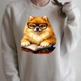 Cute Dog Pomeranian Reading Book Premium Tri-Blend Raglan Sleeve Sweatshirt Heather Forest Cute Dog Pomeranian Reading Book Premium Tri-Blend Raglan Sleeve Sweatshirt Heather Forest