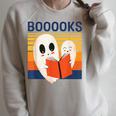 Cute Ghost Book Reading Halloween Teacher Puns Booooks Men Women Kids Raglan Sleeve Sweatshirt Heather Forest