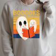 Cute Ghost Book Reading Halloween Teacher Puns Booooks For Men Women Kids Raglan Sleeve Sweatshirt Heather Forest