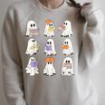 Cute Ghost Reading Books Teacher Halloween Reading Men Women Kids Raglan Sleeve Sweatshirt Heather Forest
