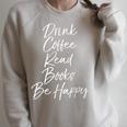 Cute Literary Saying Drink Coffee Read Books Be Happy Raglan Sleeve Sweatshirt Heather Forest
