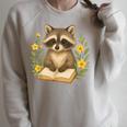 Cute Raccoon Reading Book Flowers Floral Raglan Sleeve Sweatshirt Heather Forest Cute Raccoon Reading Book Flowers Floral Raglan Sleeve Sweatshirt Heather Forest