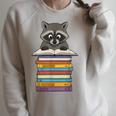 Cute Raccoon Reading On Pile Of Books Raglan Sleeve Sweatshirt Heather Forest