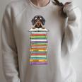 Cute Wiener Dog Dachshund Reading On Pile Of Books Raglan Sleeve Sweatshirt Heather Forest Cute Wiener Dog Dachshund Reading On Pile Of Books Raglan Sleeve Sweatshirt Heather Forest