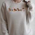 Dachshund Reading Books Cute Dog Lover Bookish Doxie Raglan Sleeve Sweatshirt Heather Forest