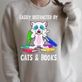 Distracted By Cats Coffee And Books Raglan Sleeve Sweatshirt Heather Forest