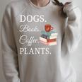 Dogs Books Coffee Plants Men Women Raglan Sleeve Sweatshirt Heather Forest Dogs Books Coffee Plants Men Women Raglan Sleeve Sweatshirt Heather Forest