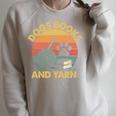 Dogs Books And Yarn Crocheting Retro Raglan Sleeve Sweatshirt Heather Forest
