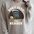 Don't Fear The Reader Kawaii Style Book Cartoon Raglan Sleeve Sweatshirt Heather Forest