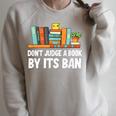 Don't Judge A Book By Its Ban Raglan Sleeve Sweatshirt Heather Forest