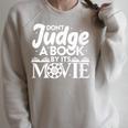 Don't Judge A Book By Its Movie Bookworm Book Lover Readers Raglan Sleeve Sweatshirt Heather Forest Don't Judge A Book By Its Movie Bookworm Book Lover Readers Raglan Sleeve Sweatshirt Heather Forest