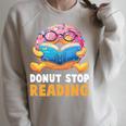 Donut Stop Reading Cute Book Reader Bookworm Donut Day Raglan Sleeve Sweatshirt Heather Forest
