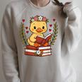 Duck Reading Book Graphic Duck With Book Floral Raglan Sleeve Sweatshirt Heather Forest