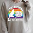 Easily Distracted By Cats And Books – Retro Sunset Rainbow Raglan Sleeve Sweatshirt Heather Forest