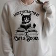 Easily Distracted By Cats And Books Book And Cat Lover Premium Tri-Blend Raglan Sleeve Sweatshirt Heather Forest
