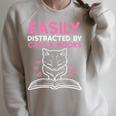 Easily Distracted By Cats Books Bookworm Women Girls Kids Performance Raglan Sleeve Sweatshirt Heather Forest