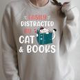 Easily Distracted By Cats And Books Cat & Book Lover For Men Women Kids Raglan Sleeve Sweatshirt Heather Forest Easily Distracted By Cats And Books Cat & Book Lover For Men Women Kids Raglan Sleeve Sweatshirt Heather Forest