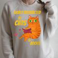 Easily Distracted By Cats And Books For Cat And Book Lover Raglan Sleeve Sweatshirt Heather Forest Easily Distracted By Cats And Books For Cat And Book Lover Raglan Sleeve Sweatshirt Heather Forest