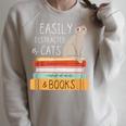 Easily Distracted Cats And Books Cat Lovers For Men Women Kids Raglan Sleeve Sweatshirt Heather Forest Easily Distracted Cats And Books Cat Lovers For Men Women Kids Raglan Sleeve Sweatshirt Heather Forest