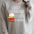 Easily Distracted By Cats And Books Cute Book Lover Raglan Sleeve Sweatshirt Heather Forest