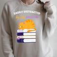 Easily Distracted Cats And Books Cute Cat Book Lover Raglan Sleeve Sweatshirt Heather Forest