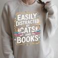 Easily Distracted By Cats And Books Raglan Sleeve Sweatshirt Heather Forest