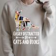 Easily Distracted By Cats And Books Reader Cat Lovers For Men Women Girls Kids Raglan Sleeve Sweatshirt Heather Forest