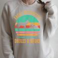 Easily Distracted By Dholes & Books Retro Wild Dogs Lover Raglan Sleeve Sweatshirt Heather Forest