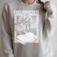Easily Distracted By Dragons & Books Artwork Raglan Sleeve Sweatshirt Heather Forest