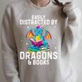 Easily Distracted By Dragons & Books Bookworm Library Raglan Sleeve Sweatshirt Heather Forest