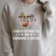 Easily Distracted By Dragons & Books Dragon Book Reading Raglan Sleeve Sweatshirt Heather Forest