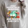 Easily Distracted By Dragons Books Cats Fantasy Book Lover Raglan Sleeve Sweatshirt Heather Forest Easily Distracted By Dragons Books Cats Fantasy Book Lover Raglan Sleeve Sweatshirt Heather Forest