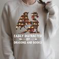 Easily Distracted By Dragons And Books Mythical Bookworm Raglan Sleeve Sweatshirt Heather Forest