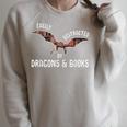 Easily Distracted By Dragons And Books Nerd Readers Raglan Sleeve Sweatshirt Heather Forest