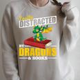 Easily Distracted By Dragons And Books Reading Book Dragon Raglan Sleeve Sweatshirt Heather Forest Easily Distracted By Dragons And Books Reading Book Dragon Raglan Sleeve Sweatshirt Heather Forest